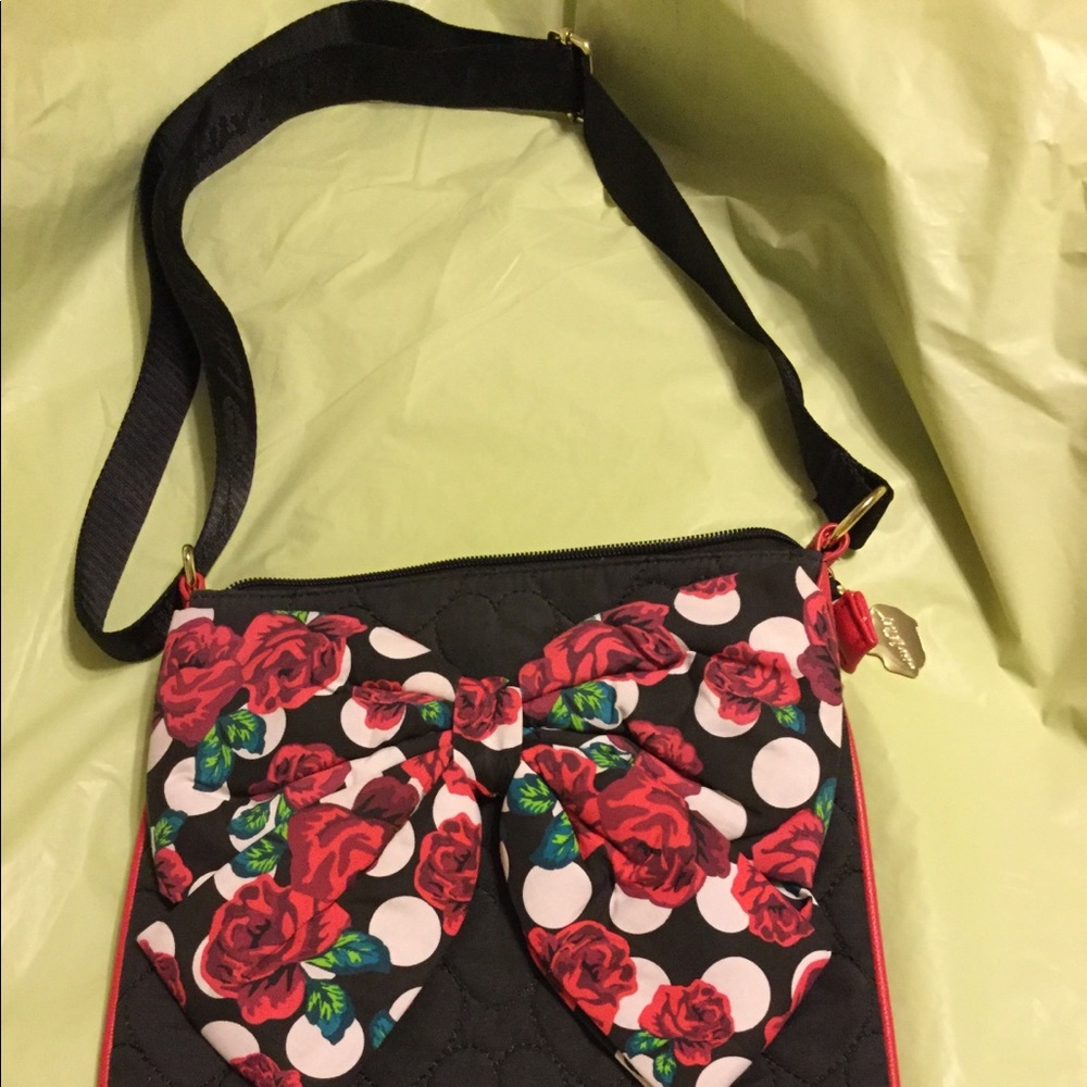 The cutest! Betsy Johnson cross body bow bag.